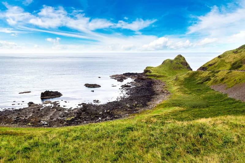 Belfast: Giant's Causeway, Coast Road & Game of Thrones Tour - Carrickfergus Castle starts the morning