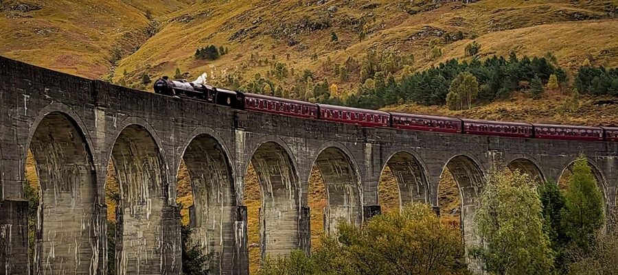 Edinburgh: Harry Potter, Glenfinnan & Highlands Private Tour - Glenfinnan Monument adds history beside Loch Shiel