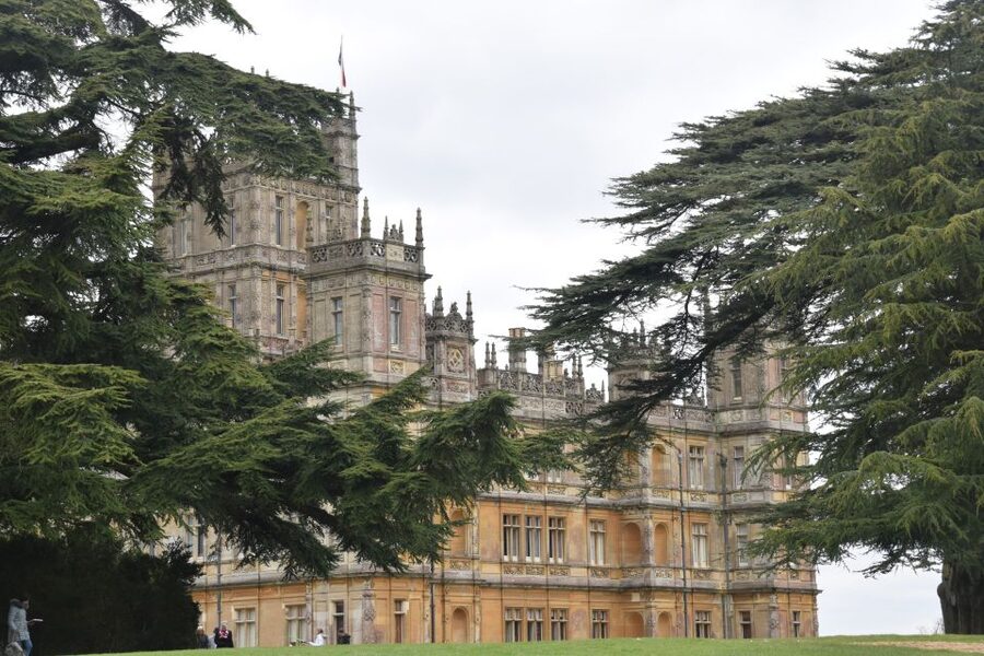 From London: Downton Abbey and Village Coach Tour - Walking through Downton village in Bampton